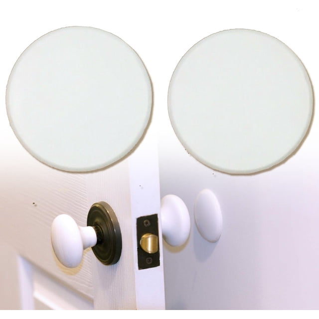 Set of 2 wall shield door knob stopper plates in a paintable white finish, designed to protect walls from damage caused by door handles. The round stick-on stoppers are shown installed behind a white door knob, creating a safe gap between the wall and the handle. Ideal for kids' rooms and bathrooms, these easy-to-install protectors feature a peel-and-stick application, making them a practical addition to door hardware and wall protection solutions.