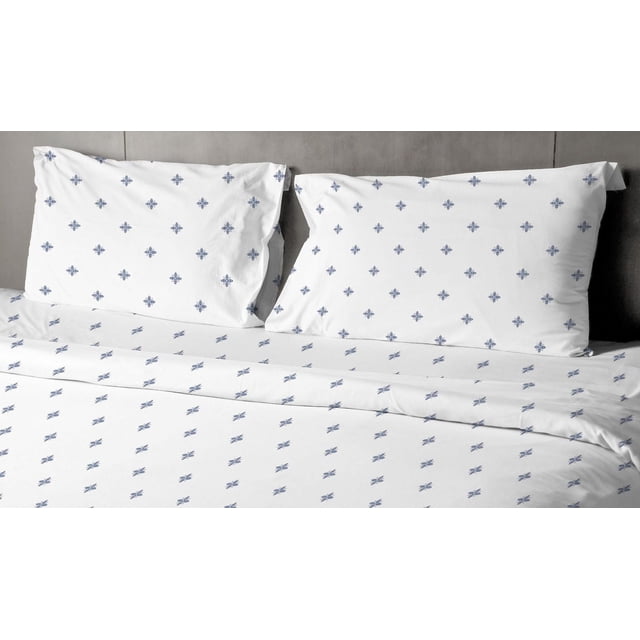 Johnson Home 200 TC Bed Sheet Set - Printed Cotton Sheets in white with small blue floral patterns, including two pillowcases and a flat sheet, displayed on a bed with a grey headboard, made from breathable 200 thread count cotton for year-round comfort and moisture-wicking properties.