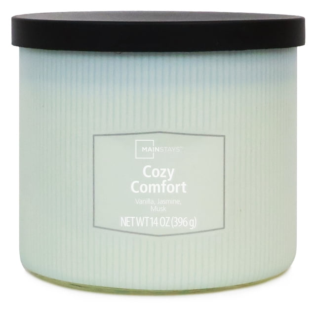 Mainstays 3-Wick Textured Wrapped Cozy Comfort Scented Candle, 14 oz, in a light blue ribbed glass jar with a black lid, labeled with vanilla, jasmine, and musk scent notes, suitable for home décor and creating a relaxing atmosphere.