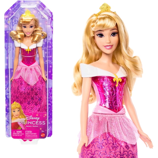 Princesse Disney Aurora Poupée Mannequin et Accessoire Mettant en Vedette une Poupée Articulée Vêtue d'Un Corsage Rose Scintillant avec une Jupe Amovible à Motif Violet, de Longs Cheveux Blonds Coiffés de Vagues, et un Diadème Doré, Illustrés dans l'Emballage et Sortis de la Boîte.
