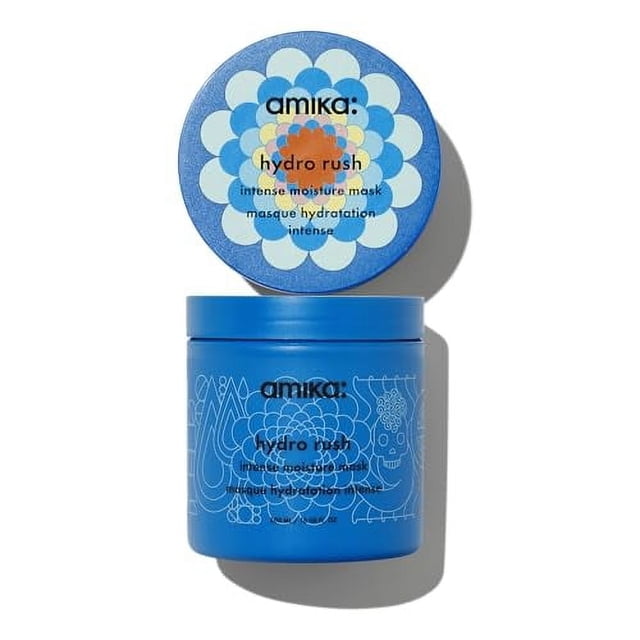 amika Hydro Rush Intense Moisture Mask with Hyaluronic Acid, 500ml, displayed in a vibrant blue container with floral design and matching lid. This hydration mask is ideal for dry, coarse hair, offering 5x hydration, reduced breakage, and stronger strands.