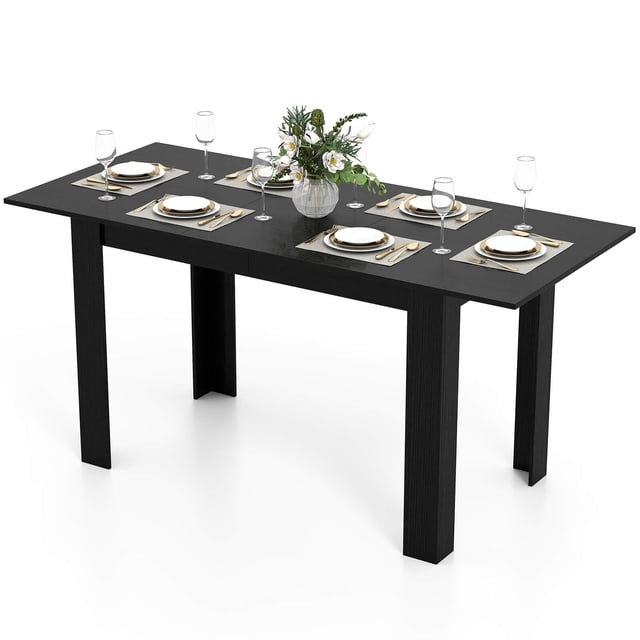 Costway 47"-62" Extendable Dining Table for 4-8 People in black, featuring a rectangular engineered board tabletop with a smooth waterproof finish and sturdy L-shaped legs. The table is set with plates, glasses, and a floral centerpiece, showcasing its spacious design for dining, gatherings, or use as a study or office desk. Ideal for dining rooms, home offices, or versatile kitchen furniture.