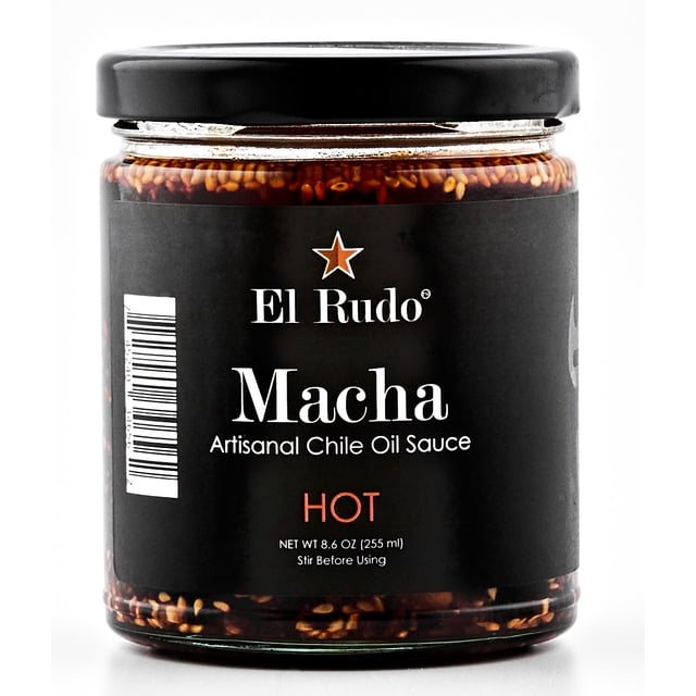El Rudo Salsa Macha - Chili Oil Sauce - Hot Sauce (Single-Pack), an 8.6 oz glass jar with a black label featuring 'Macha Artisanal Chile Oil Sauce' and 'Hot' in bold red text. The jar highlights a handcrafted blend of sesame seeds, dried chiles, and spices, ideal as a spicy condiment for tacos, noodles, or pizza.