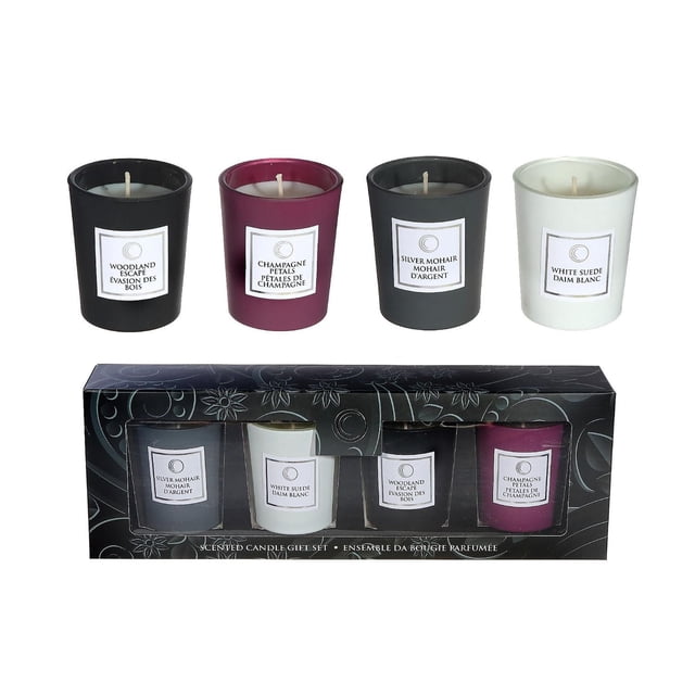 4 Pack 2.5 Oz Luxe Scented Glass Candle Gift Set with four multicolored glass candles labeled Woodland Escape, Champagne Petals, Silver Mohair, and White Suede, displayed above a black floral-patterned gift box, suitable for home décor and gifting.