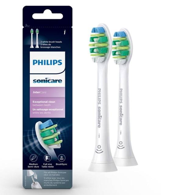 Philips Sonicare Têtes de Brosse de Rechange Spécialisées Intercare, Blanches, 2 Unités, HX9002/92, Montrant Deux Têtes de Brosse Blanches avec des Poils Bleus, Verts et Blancs Conçus pour l'Élimination Avancée de la plaque et le Soin des Gencives, Affichées à Côté de l'Emballage du Produit avec des Icônes de Marque Philips et d'Utilisation.