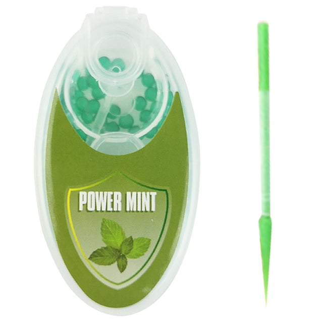 Capsules pour Perles Explosion Boule Capsule Capsules Comprend 200 Pcs Perles Éclatées. l'Image Affiche une Capsule Transparente avec une Étiquette Verte « Power Mint », Contenant de Petites Perles Éclat Vertes. un Cure-Dent Vert Est Inclus, Montré à la Droite de la Capsule. Fait à Partir d'Huile Végétale Naturelle et de Gomme, Il Est portable et Conçu pour Rehausser le Goût et Réduire le stress.