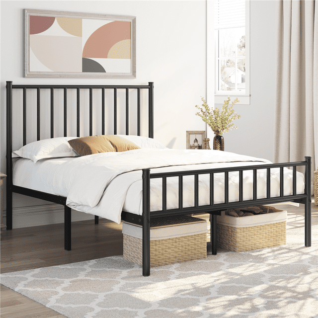 Yaheetech Metal Platform Bed with Spindle Headboard, Full, Black. This bed frame features a durable black powder-coated metal construction with a spindle-style headboard and footboard. It includes 12 slats and multiple support legs, providing stability for mattresses without requiring a box spring. The frame offers 800 lb weight capacity and under-bed storage space for items like luggage or baskets. Shown in a bright bedroom with neutral decor and storage baskets underneath.