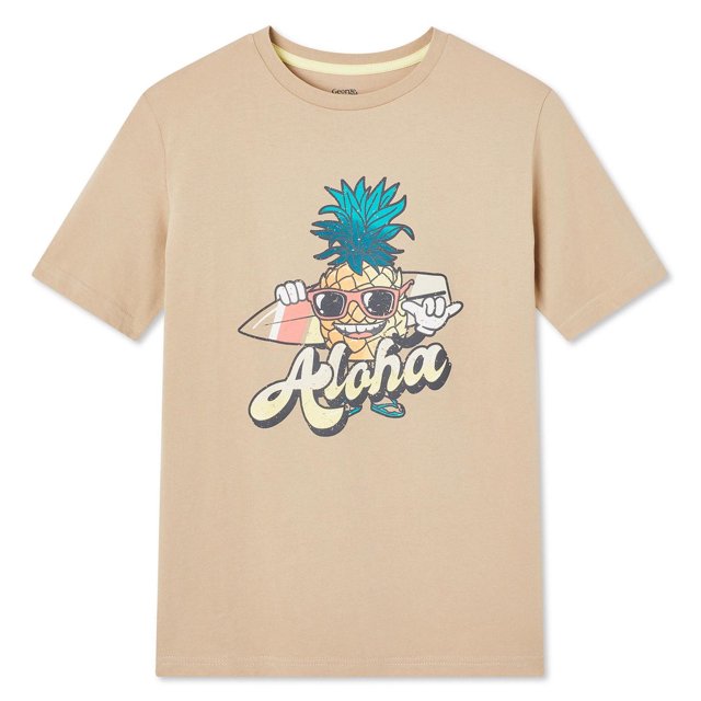 George T-shirt Graphique beige pour Garçons avec Imprimé Graphique à l'Avant d'Un Ananas de Dessin Animé Tenant une Planche de Surf et le Mot « Aloha » en Écriture, Fait de Tricot jersey 100 % Coton avec Encolure Ras du Cou et Manches Courtes, Convient au Port Décontracté au Quotidien.