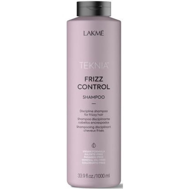 Lakmé Teknia Frizz Control Shampoo in a 1000ml bottle. The sulfate-free formula is designed to moisturize and restore softness to rebellious and voluminous hair while reducing frizz by 68%. Suitable for both straight and curly hair, it provides a natural feel.