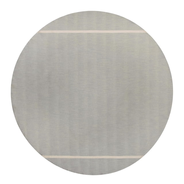 Better Homes & Gardens Grey Fringe Cotton Tablecloth 70" Round in solid grey flannel with natural woven texture and two thin natural horizontal stripes near the edges, made from 100% cotton with power loom weaving, suitable for dining table linens and often used as a decorative picnic cover.
