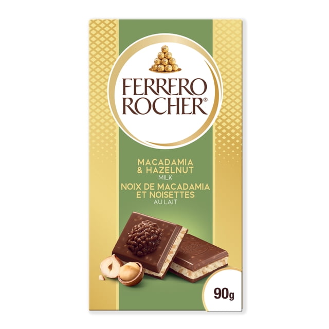 FERRERO ROCHER Premium Chocolate Bar, Macadamia and Hazelnut Milk Chocolate, 90g, front packaging with gold and green design, showing two milk chocolate squares with crunchy hazelnut pieces and creamy macadamia filling, alongside whole and halved macadamia nuts, suitable for everyday enjoyment and holiday treats.