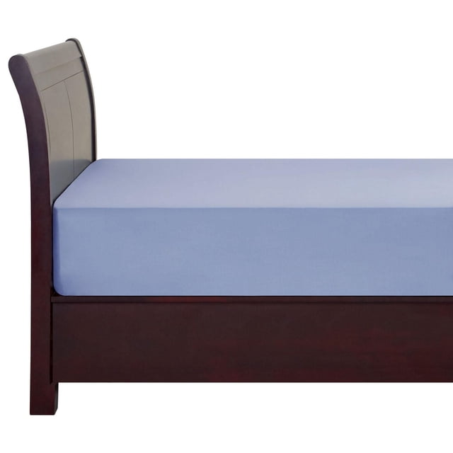 Mainstays Fitted Sheet in light blue on a dark wood bed frame with curved headboard, made of breathable 100% cotton with 180 thread count, fits mattresses up to 12 inches deep, machine washable and softens with each wash.