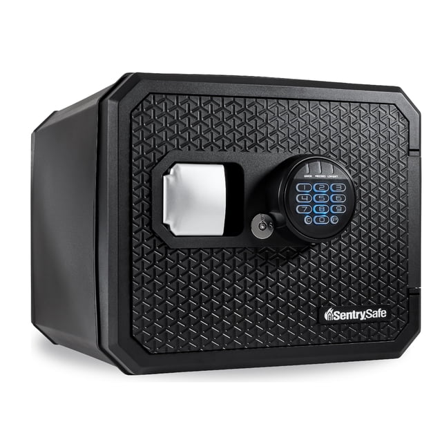 SentrySafe Fireproof and Waterproof Large Safe with Digital Keypad, Override Key, and Adjustable Shelf, 0.81 cubic feet. This fireproof safe is UL Classified to protect valuables for 1 hour in up to 1700°F. The waterproof safe features a textured black exterior with a diamond pattern, a digital keypad with blue backlit numbers, and a key override slot. Ideal for home, dorm, or office use.