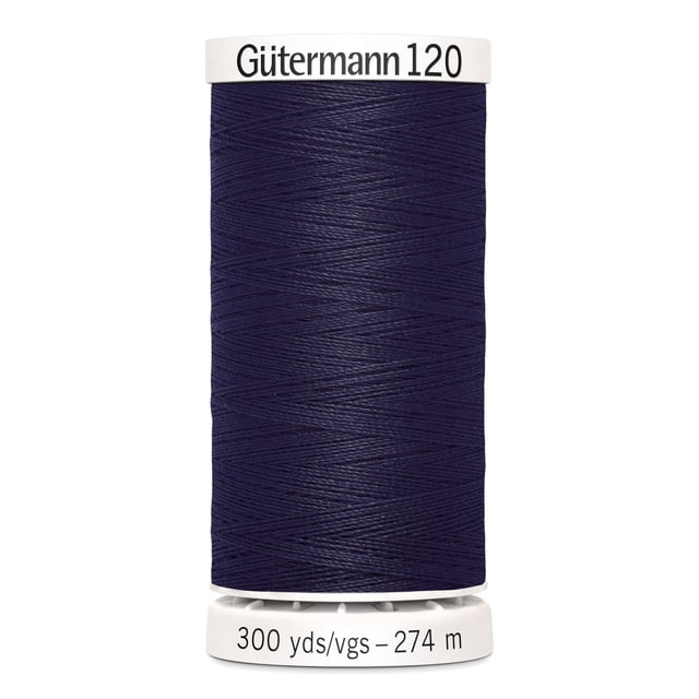 Gutermann 120 100% polyester all purpose thread spool in dark navy blue tightly wound on a white plastic spool labeled with brand and 300 yards (274 meters) length, suitable for machine and hand sewing woven, knit, and synthetic fabrics, also ideal for craft and mending projects.