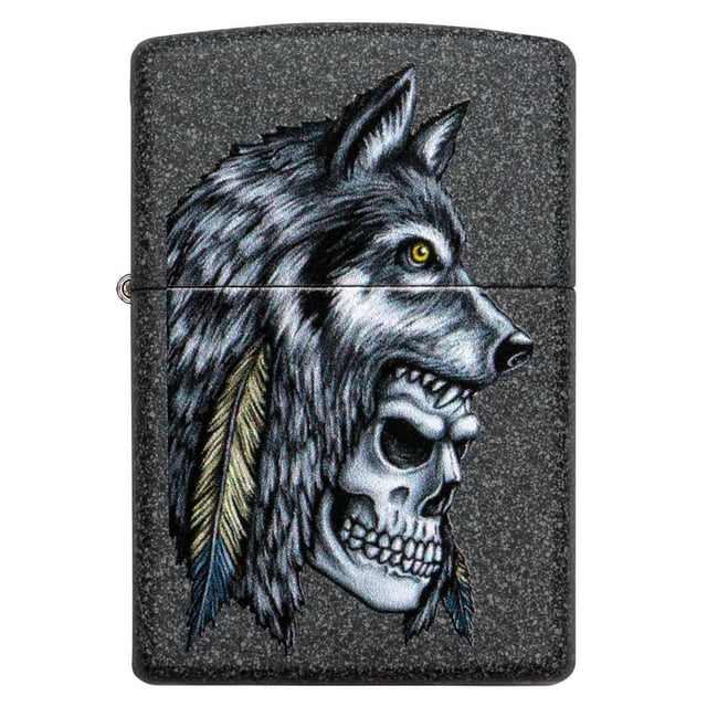 Zippo Wolf Skull Feather Design (29863) iron stone windproof lighter with a detailed wolf head and human skull graphic, accented by blue and yellow native-style feathers on a textured dark gray metal surface, refillable and made in USA with lifetime guarantee.