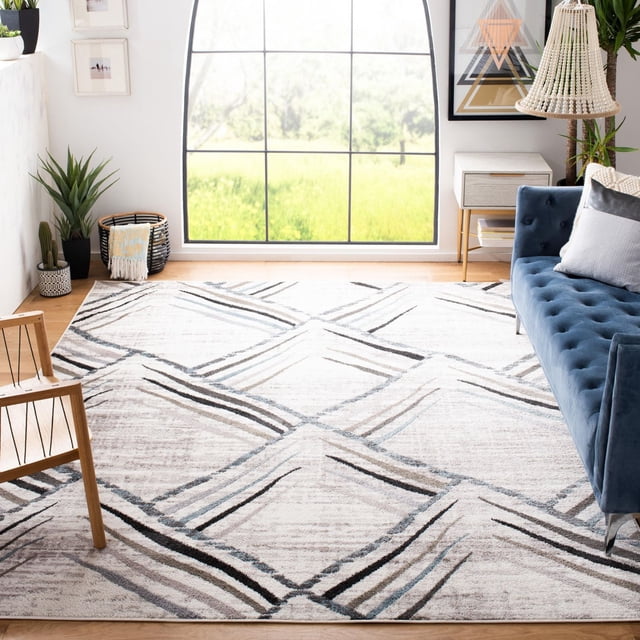 SAFAVIEH Amsterdam Ravenna Tapis à Losanges Géométriques avec une Tonalité Terre Douce et des Motifs Géométriques en Losanges Gris, Noir et beige. Tissé Mécaniquement à Partir de Fils Synthétiques Durables, Il Est Posé sur un Plancher de Bois Clair dans un Salon Lumineux avec une Grande Fenêtre Arquée, sofa Capitonné Bleu, Chaise en Bois et Plantes, Convient comme Tapis d'Accent Rustique-Chic.