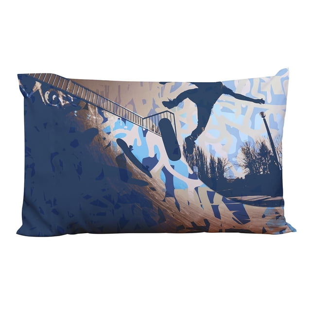 Mainstays Kids Printed Pillowcase measuring 20 by 30 inches, made of 100% polyester microfiber, featuring a skateboarder performing a trick on a ramp with blue and beige abstract graffiti patterns, suitable for adding a fun element to kids' bedding.