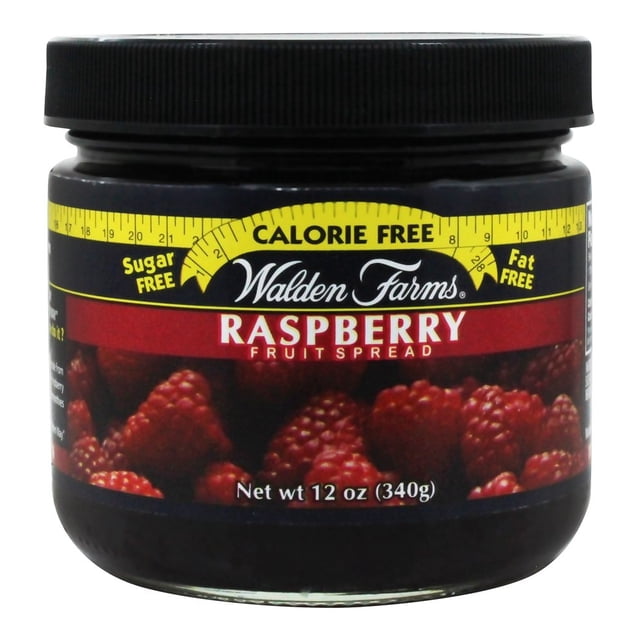 Walden Farms Calorie Free Raspberry Fruit Spread in a 12 oz jar. The label highlights 'Calorie Free,' 'Sugar Free,' and 'Fat Free' features, with an image of fresh raspberries on the front. Ideal for toast, pancakes, oatmeal, yogurt, smoothies, or PB&J sandwiches.