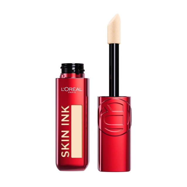 L'Oreal Paris Foundation & Concealer Hybrid Infallible Skin Ink in a glossy red rectangular bottle with gold lettering and a black screw cap, shown with the applicator wand removed revealing a beige angled sponge tip, designed for longwear, transfer-resistant, matte finish makeup that provides buildable coverage and even complexion.