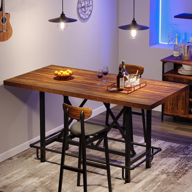 Fnova 35.4" tall rectangular dining table with a wood-grain top and black metal frame, designed for six people. The table features a sturdy X-shaped steel support, an integrated metal footrest for comfort, and a waterproof, scratch-resistant surface. Ideal for kitchens, studios, or small dining spaces, it is shown in a modern dining room setting with pendant lighting, chairs, and tableware.