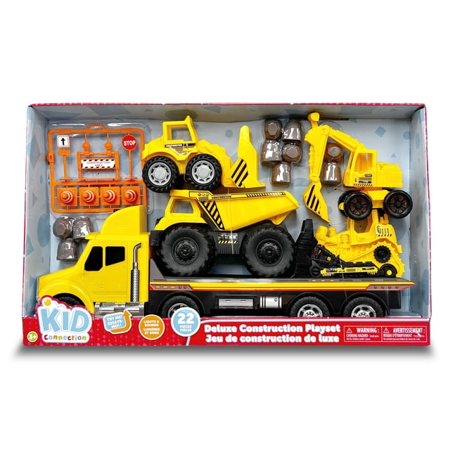 Kid Connection Deluxe Construction Play Set with a yellow toy transporter truck carrying a large dump truck, front loader, and excavator, including 10 brown toy stones, orange road signs, and play accessories, featuring lights and sounds for interactive pretend play.