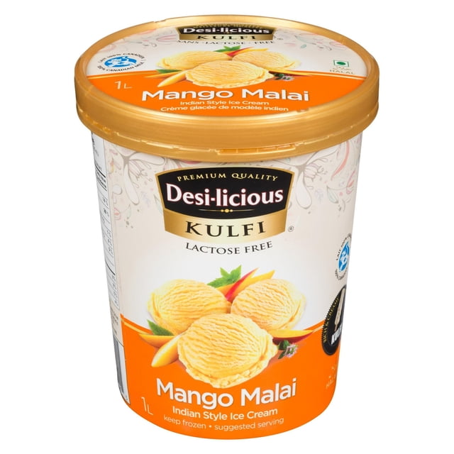 Desi-licious Contenant de Crème Glacée Style Indien Kulfi Mangue Malai 1 L avec Couvercle Doré, Présentant une Étiquette orange et Blanche Affichant Trois Cuillères de Kulfi à Saveur de Mangue avec des Tranches de Mangue et des Feuilles de Menthe, Sans Lactose et de Qualité Supérieure, Convient au Plaisir des Desserts Glacés et Est Souvent Utilisé comme alternative Riche aux Gâteries.