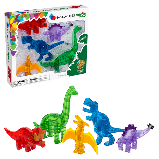 MAGNA-TILES® Dinos set featuring five magnetic dinosaur figurines in vibrant translucent colours, including red, green, blue, yellow, and purple. The dinosaurs, ranging from 3 to 7.5 inches in size, have movable parts and are displayed in front of the product packaging. The packaging highlights the set's compatibility with other MAGNA-TILES sets and its suitability for ages 3 and up.