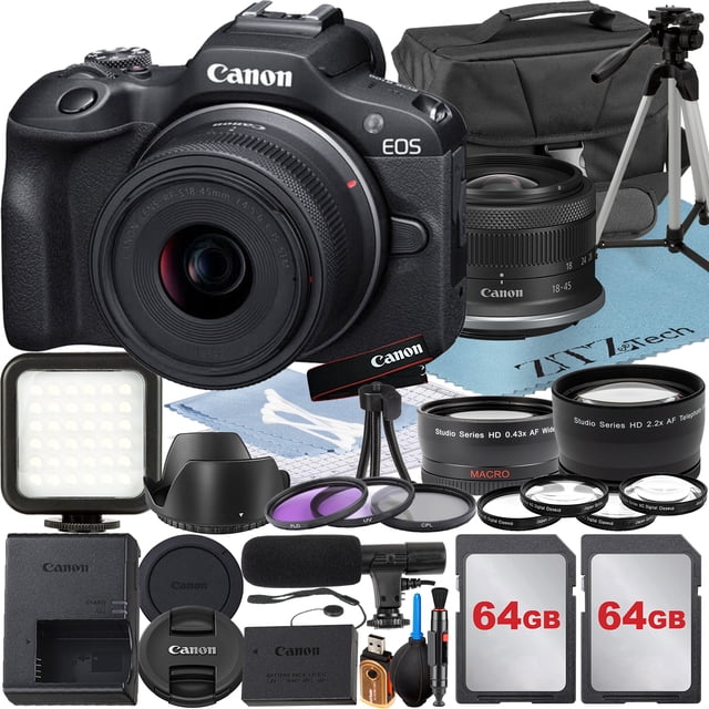 Canon EOS R100 Mirrorless Camera bundle designed for content creators, featuring a 24.1MP APS-C CMOS sensor, DIGIC 8 processor, and RF-S 18-45mm f/4.5-6.3 IS STM lens. Includes two SanDisk 64GB memory cards, padded camera case, tripod, LED flash light, UV filter, auxiliary telephoto and wide-angle lenses, filter kit, close-up kit, professional microphone, lens accessories, cleaning tools, and starter kit. Supports 4K 24p video recording, Full HD 60p, and seamless connectivity with Wi-Fi and Bluetooth.