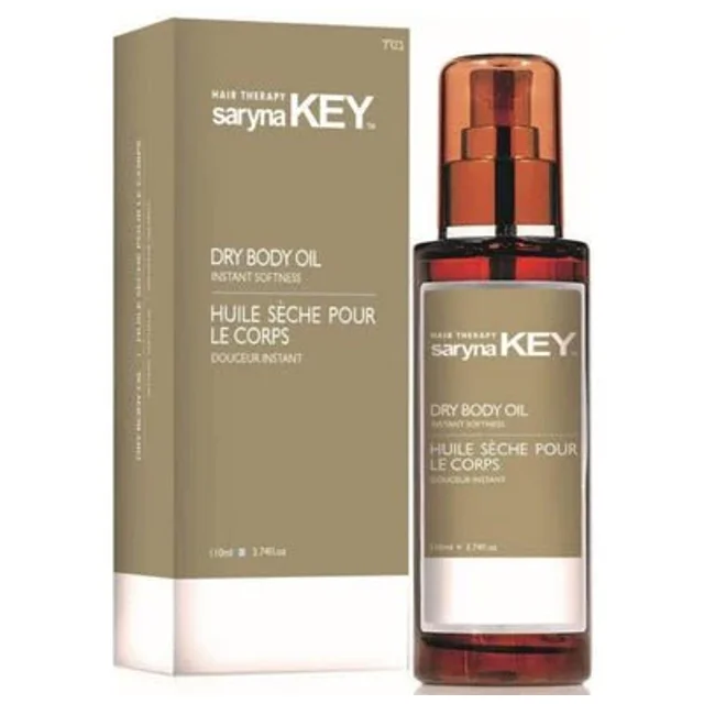 SARYNAKEY Huile Sèche pour le Corps 110 ml, Comprenant une Bouteille Ambre Élégante avec un Distributeur à Pompe et un Emballage Assorti. Cette Huile Sèche pour le Corps Est Enrichie de Beurre de Karité, d'Huile d'Olive et d'Huile de jojoba pour Nourrir et Hydrater la Peau. Elle s'Absorbe Rapidement, Laissant la Peau Soyeuse, Lisse, Éclatante et Non Grasse. le Produit Est Conçu pour Améliorer l'Élasticité de la Peau et Favoriser un Éclat Sain.