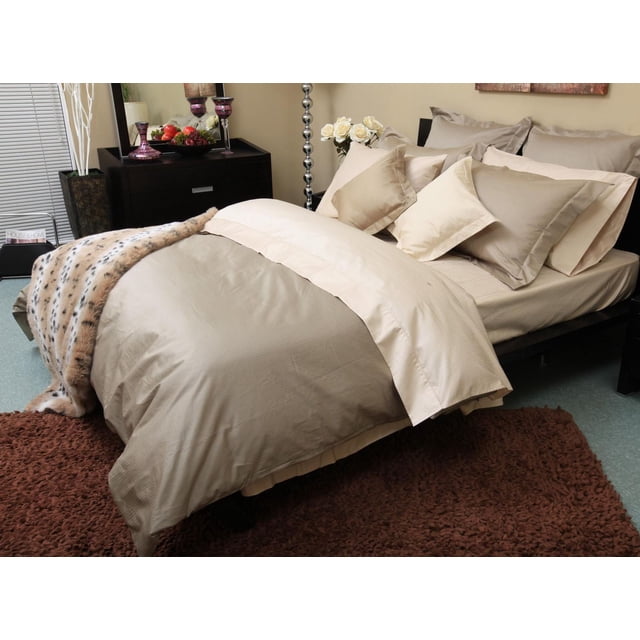 Ambassador 600 Thread Count Maholi Tuxedo Stripe Cotton Sheet Set in sand color on a bed with matching pillowcases and a beige top sheet featuring a dobby pinstripe pattern, styled with a faux fur throw and brown shag rug, ideal for enhancing bedroom comfort and decor.