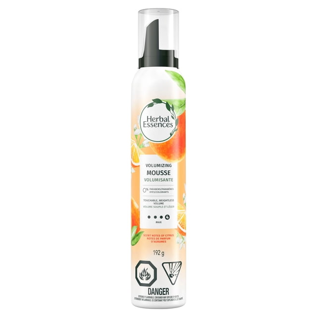 Herbal Essences Volumizing Mousse bottle with black pump dispenser, providing weightless volume and all-day hold for fine hair, scented with fresh citrus notes, showing 192 g net weight and safety warnings on a white background.