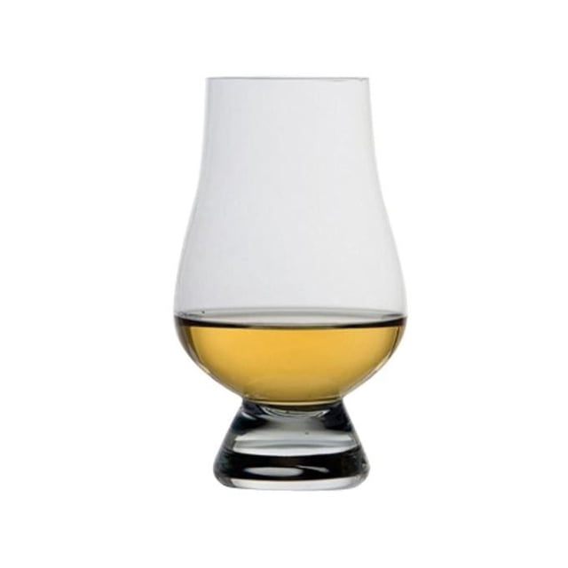 Glencairn Scotch Glass ea Gift Boxed shown front-facing, partially filled with amber whisky. It features a wide bowl tapering to a narrow mouth and a solid base for comfortable holding, designed to enhance whisky tasting and suitable for dining and entertaining.