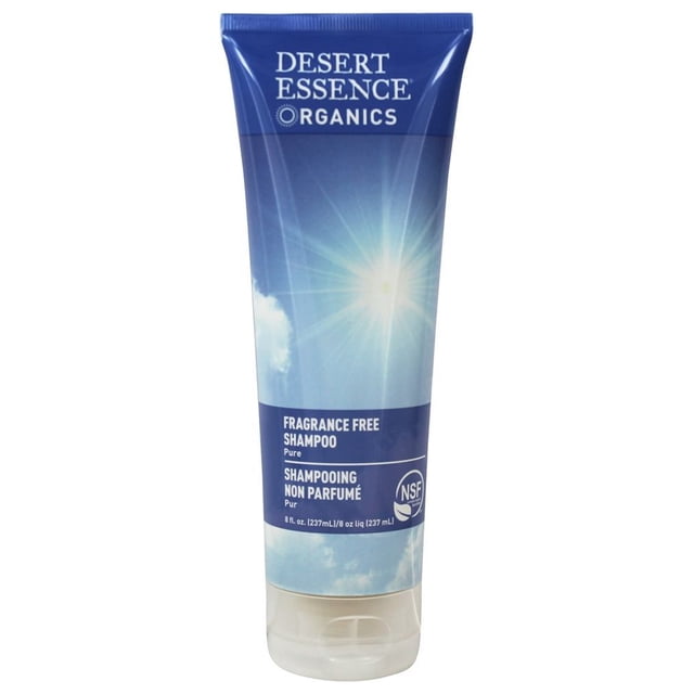 Desert Essence Fragrance Free Shampoo 8 fl. oz. (237 mL) in a blue tube with sunburst and sky graphics, providing gentle, unscented cleansing with organic extracts to moisturize and strengthen hair without artificial dyes or fragrances.
