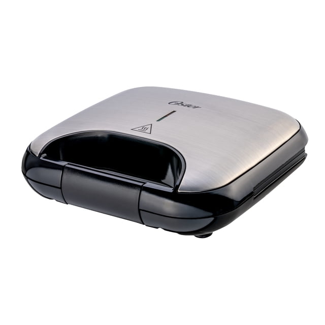 Oster DiamondForce Sandwich Maker with brushed stainless steel top and black base, closed at a 3/4 angle. Features DiamondForce nonstick coating, dual indicator lights, and compact design holding four triangle-cut sandwiches for fast, easy meal prep.