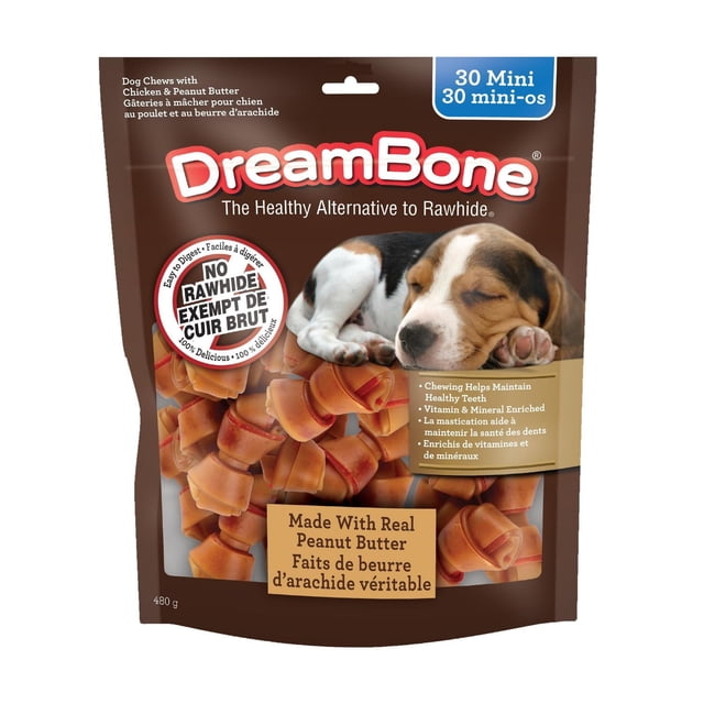 DreamBone Mini Bones Made With Real Peanut Butter 30 Count, rawhide-free dog chews for small dogs in a brown resealable bag featuring bone-shaped treats made with real peanut butter and chicken, enriched with vitamins and minerals to help maintain healthy teeth and gums.
