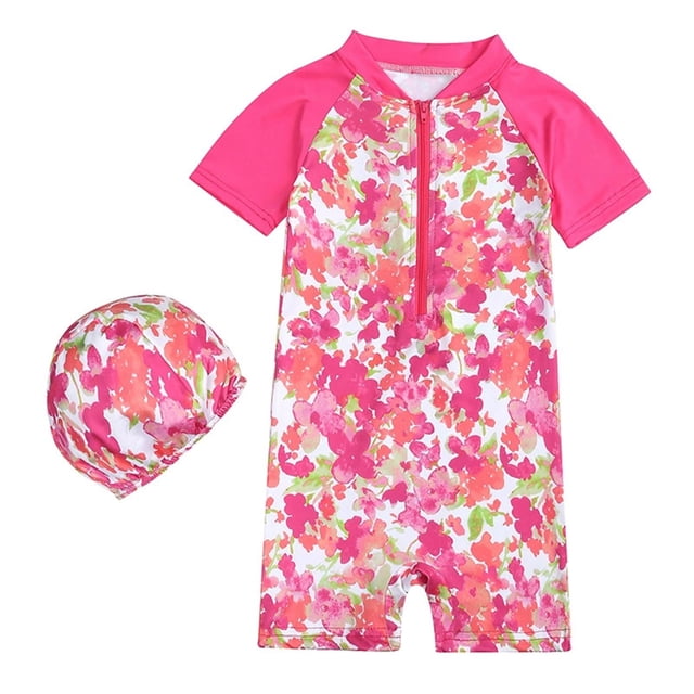 Girls Rash Guard Swimming Bathing Suit Hawaiian Ruffle Sun Protection Long Sleeve Kids Swimsuit for 3-4 years. The swimsuit features a vibrant floral pattern in pink, white, and green with short sleeves and a front zipper. Includes a matching swim cap with the same floral design. Made with lightweight, quick-drying fabric for comfort and durability, ideal for swimming, beach outings, and water activities.