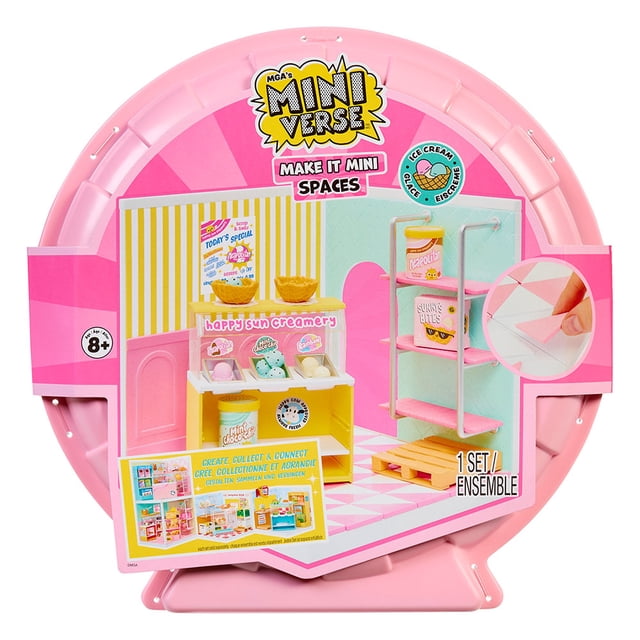 MGA's Miniverse™ Make It Mini Spaces™ Ice Cream Shop building set in a pink circular case featuring a miniature ice cream shop with yellow and white striped walls, pastel pink and white tiled floor, ice cream display with scoops and waffle cones, and a pink three-tier shelf with mini accessories, suitable for ages 8 and up.