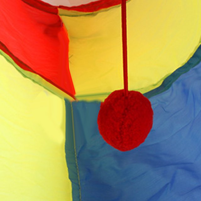 Cat Tunnel Cat Tunnel Toy Pet Play Tunnel Little Pet Tunnel Cat Toy Cat Tunnel Safe Eco Friendly Interactive Rainbow Pet Play Tunnel For Little Pets Dogs. A close-up view of the multicolour polyester cat tunnel featuring vibrant red, yellow, and blue panels. The tunnel includes a hanging red pom-pom toy for interactive play, designed to relieve boredom and stress for small pets.