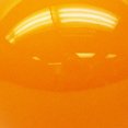 thumbnail image 3 of Bougie en forme de boule orange haute brillance, non parfumée, 3 of 5