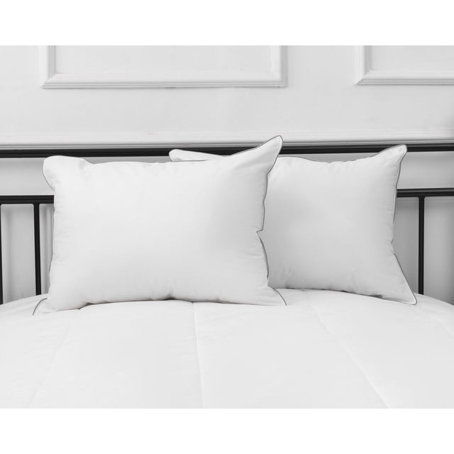 Millano Health Hypoallergenic Pillow - 2 Pack with two white pillows on a bed featuring breathable 250 thread count 100% cotton covers and polyester microgel filling, pre-treated with SilverClear to help eliminate odours and promote a healthy sleep environment, machine washable for easy care.