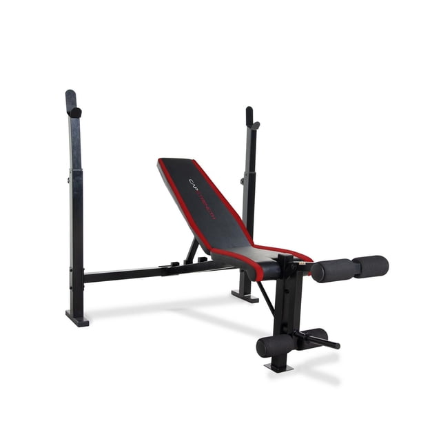 CAP Strength Olympic Weight Bench with Leg Extension featuring a black powder-coated tubular steel frame, adjustable uprights, and a five-position back pad with black and red premium upholstery. It includes foam rollers for leg extension and curl exercises and supports up to 500 lbs, suitable for comprehensive strength training at home.