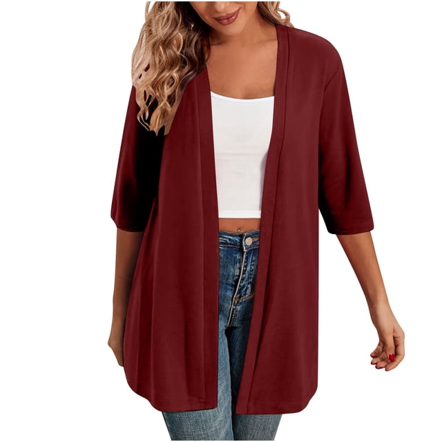 Timegard Cardigans for Women, a lightweight 1/2 sleeve open front cardigan in a solid deep red color. Made from stretchy and cozy fabric, this casual loose jacket top is styled with a white tank top and blue jeans, ideal for layering during spring, fall, or cooler months. Perfect as a women's lightweight sweater for casual outings.