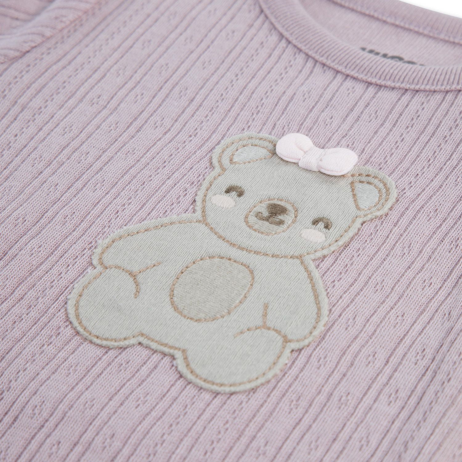 Grenouillère à pieds Huggies® en coton biologique pour bébé fille