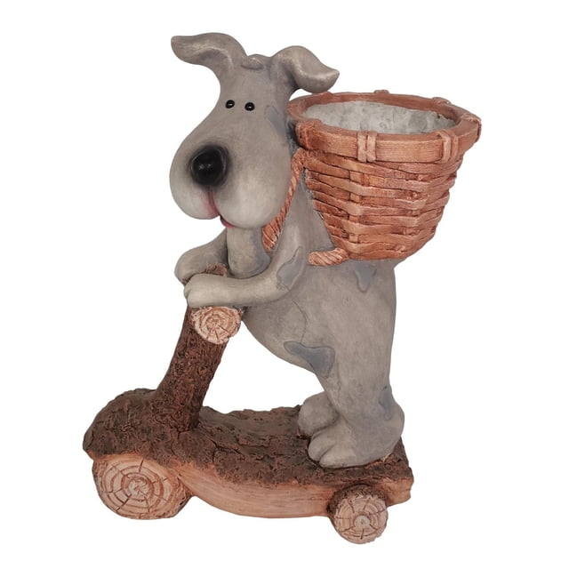 Angelo Décor Scooter Dog Planter Statue depicting a gray dog with darker patches riding a rustic wooden scooter with log-textured wheels, holding the handlebar, and carrying a woven basket planter on its back, suitable for garden or patio outdoor décor.
