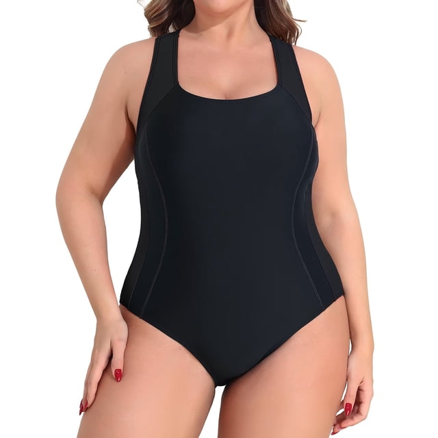 Charmo Plus Size Side Spliced One Piece Sport Swimsuit for Women featuring a racerback design and high-cut silhouette. Made from 82% nylon and 18% spandex, this black swimsuit offers stretchy, quick-dry, and breathable fabric. It includes a built-in removable bra for support and coverage, ideal for swimming, training, surfing, and other water activities.