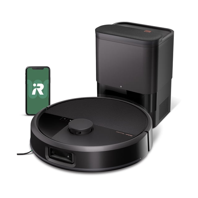 iRobot Roomba® Max 705 Vac Robot+ AutoEmpty™ Dock shown in a front 3/4 view with a matte black circular robot vacuum featuring a textured top and raised sensor dome, paired with a matching rectangular AutoEmpty™ dock and a smartphone displaying the iRobot app logo, illustrating advanced robot vacuum and self-emptying dock technology.