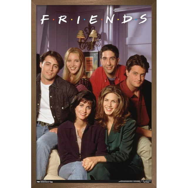 Friends - Apartment Wall Poster, 22.375" x 34" featuring the six main characters from the TV show Friends posed in a purple apartment setting with the iconic white FRIENDS logo and colored dots above, framed in light brown wood, ideal for home or dorm wall décor and gifting.