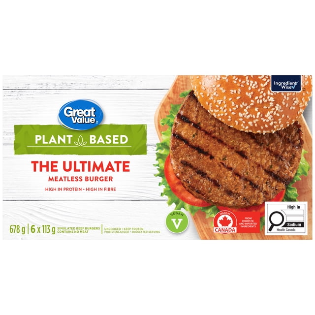 Great Value The Ultimate Meatless Burger Galette de Bœuf Simulée d'Origine Végétale dans un Petit Pain aux Graines de Sésame avec Laitue et Tomate sur une Planche en Bois, Végétalien, Riche en Protéines et en Fibres, Fabriqué au Canada, Convient à la Préparation de Repas Surgelés Rapides.