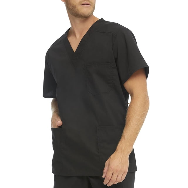 Scrubstar Men's Core Essentials V-Neck Scrub Top in black shown on a male model from a front 3/4 angle, featuring a V-neckline, one chest pocket, two lower patch pockets, and side vents. Made of breathable brushed cotton poplin fabric for comfort and easy care in healthcare settings.