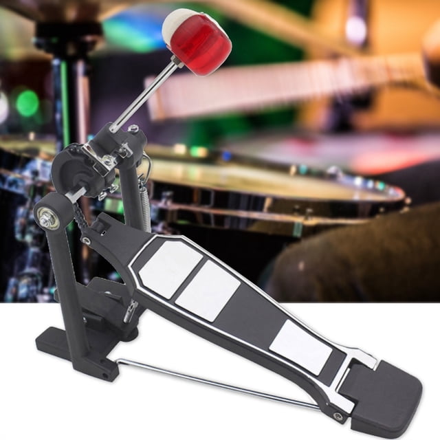 Drum Set, Durable Drum Beater, featuring a red drum hammer with a stainless steel handle attached to a bass drum pedal. Designed for practice and performance, this premium material drum accessory is suitable for professionals and beginners. The background shows a blurred drum set in a performance setting.